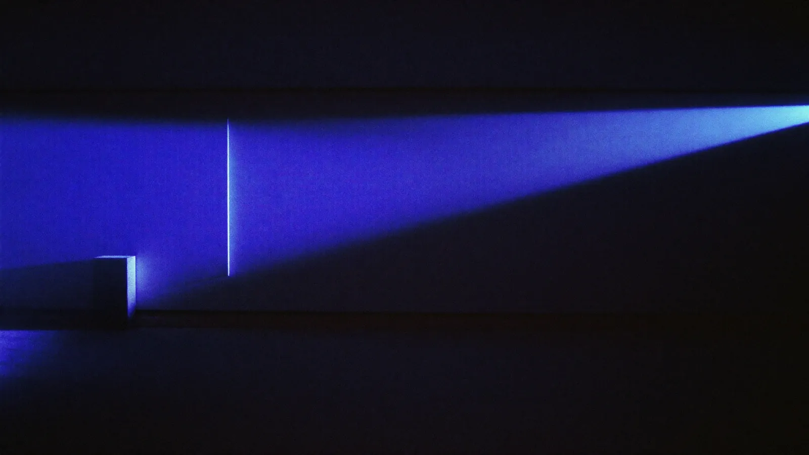 An indigo shaft of light raking a dark interior — AI relighting.